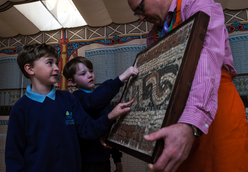School Children looking at Mosaic